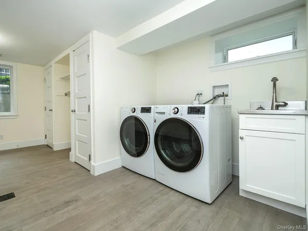 a utility room with dryer and washer
