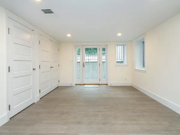 a bathroom with a toilet a sink and bathtub