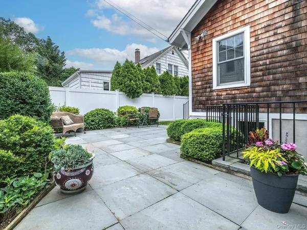 a house view with a garden space