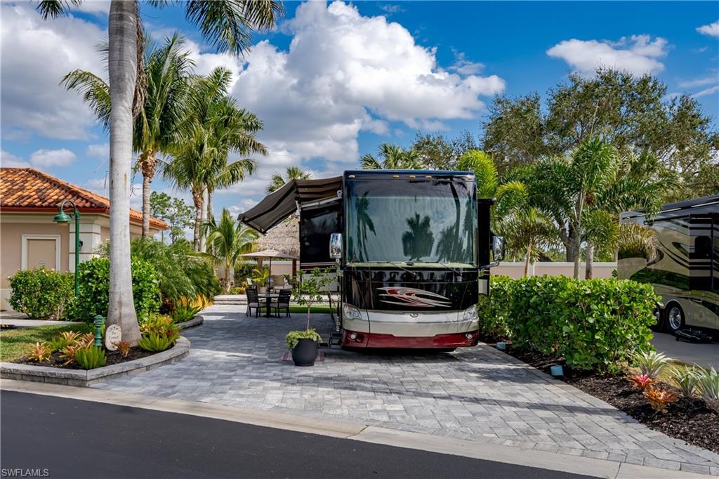 a view of house with outdoor space and entertaining space
