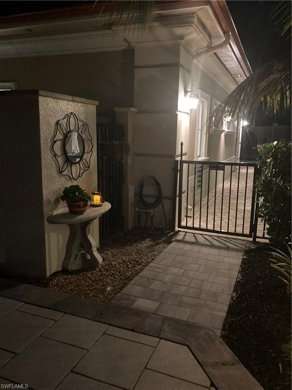 13595 Snook Circle Naples, FL 34114 - Photo 29 of 35 a view of a entryway door of the house