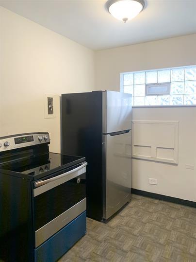 2126 South 18th Avenue Broadview, IL 60155 - Photo 11 of 16 a kitchen with a refrigerator and a stove