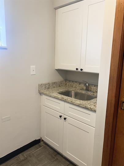 2126 South 18th Avenue Broadview, IL 60155 - Photo 14 of 16 a view of a storage and utility room with washer and dryer