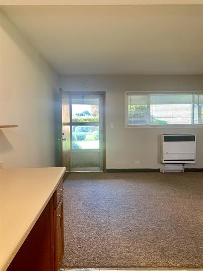 2126 South 18th Avenue Broadview, IL 60155 - Photo 4 of 16 a view of an empty room with a window