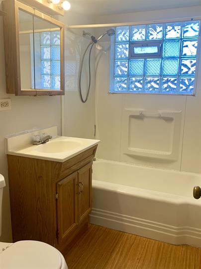 2126 South 18th Avenue Broadview, IL 60155 - Photo 8 of 16 a bathroom with a sink and a mirror