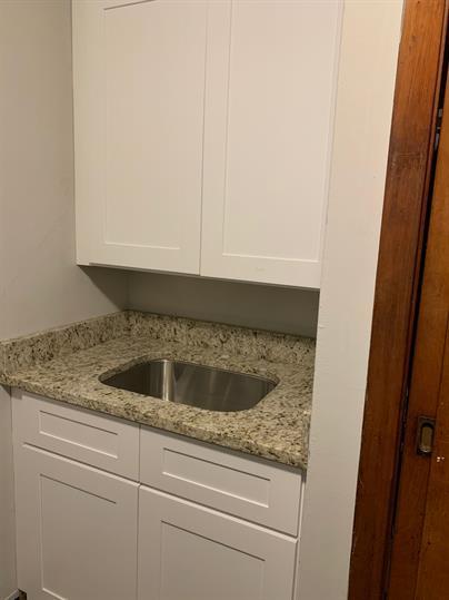 2126 South 18th Avenue Broadview, IL 60155 - Photo 9 of 16 a close view of sink and tap