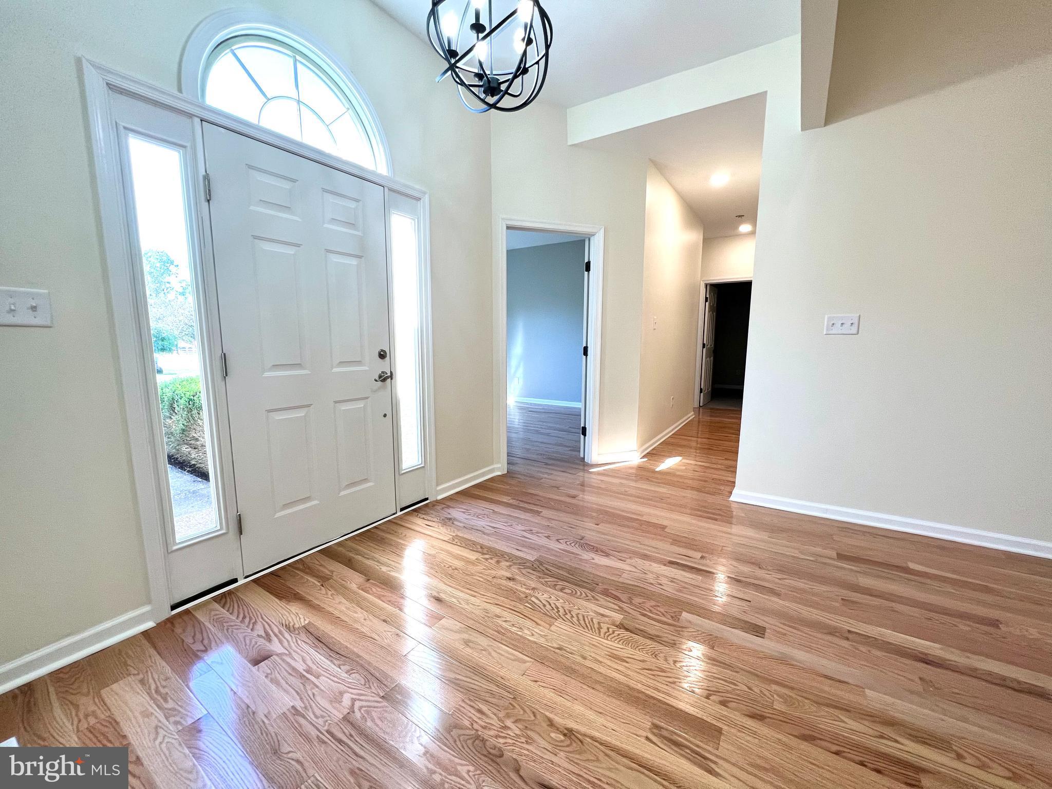 1 Cutter Way Middletown, DE 19709 - Photo 19 of 41 a view of empty room with wooden floor
