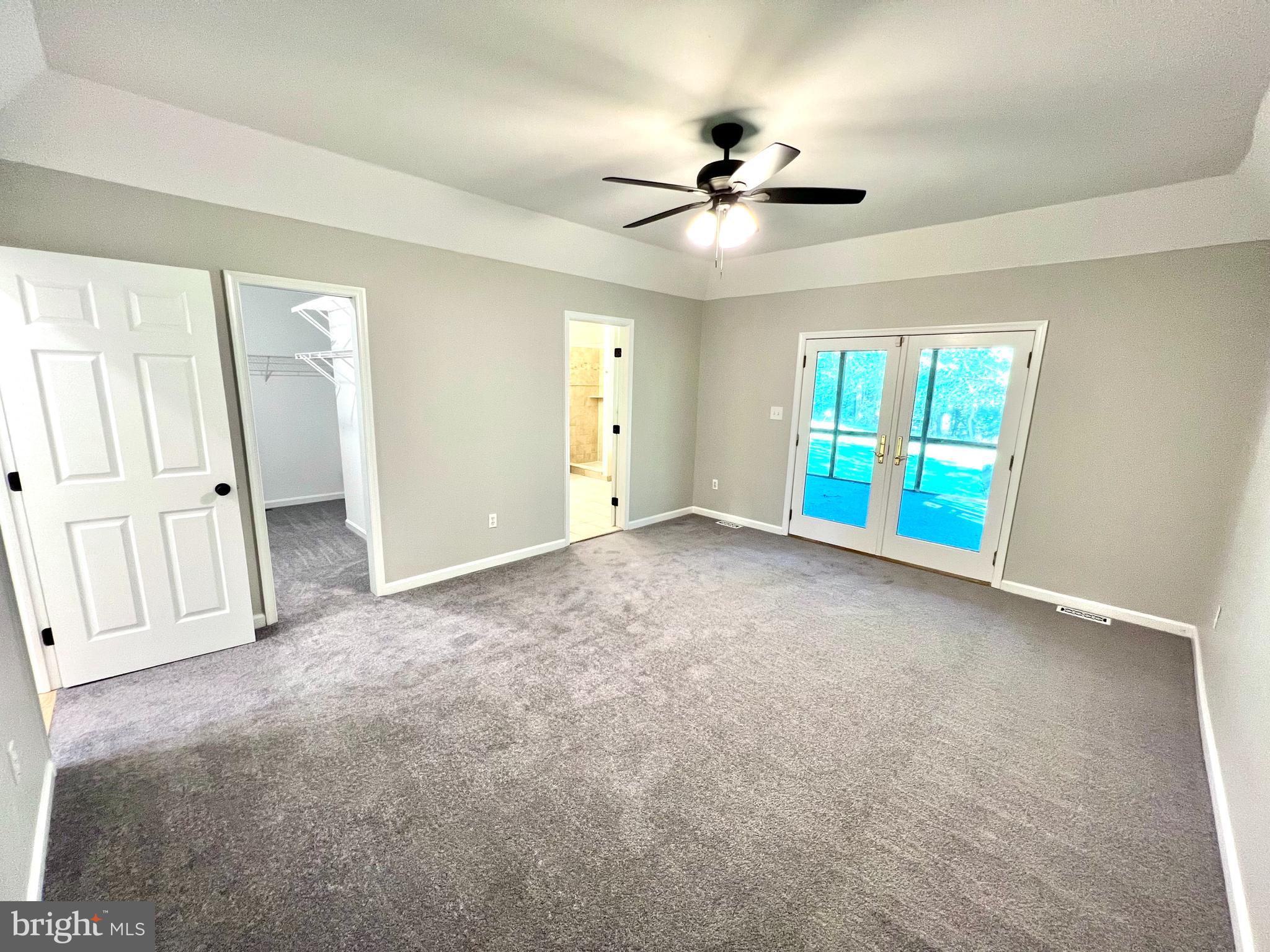 1 Cutter Way Middletown, DE 19709 - Photo 26 of 41 an empty room with windows and fan