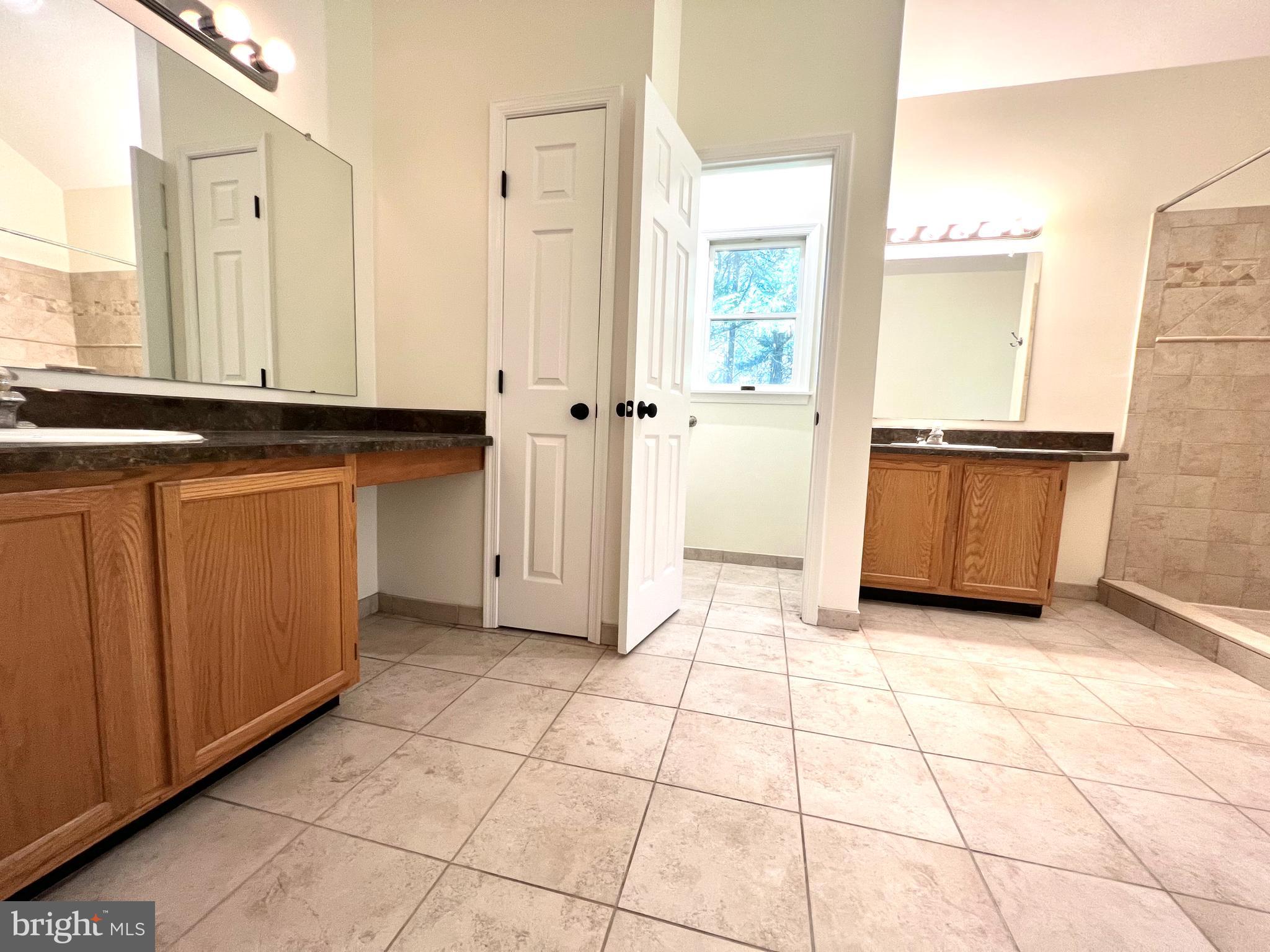 1 Cutter Way Middletown, DE 19709 - Photo 30 of 41 a view of a kitchen with kitchen island granite countertop a refrigerator and a sink