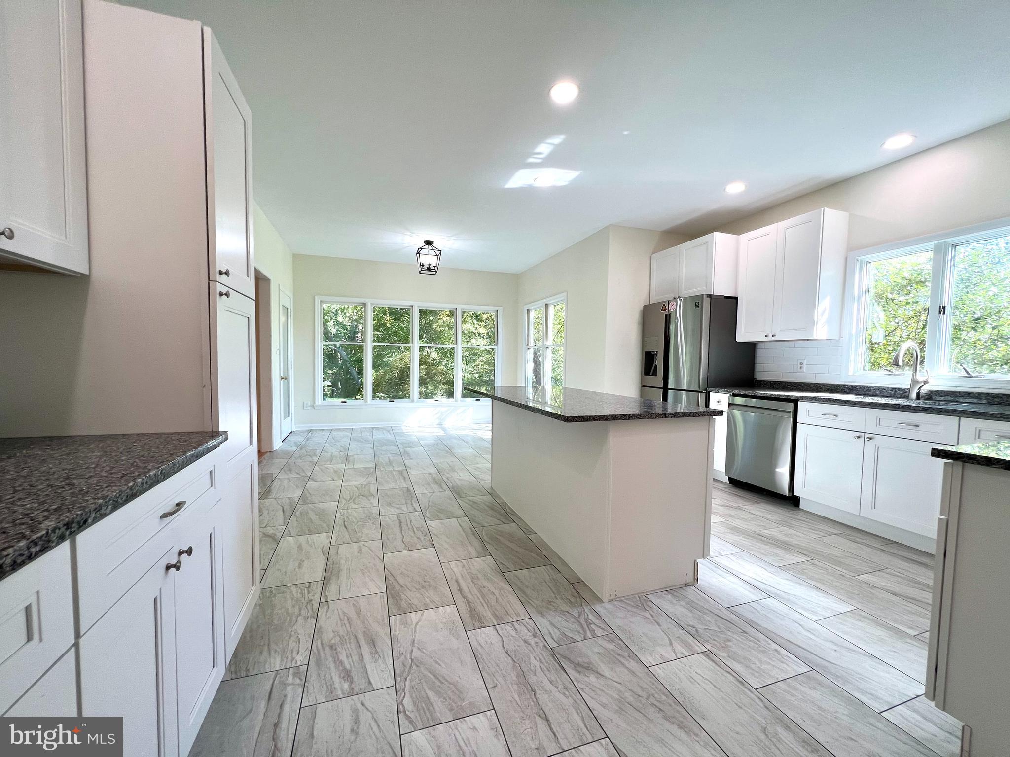 1 Cutter Way Middletown, DE 19709 - Photo 3 of 41 a large kitchen with stainless steel appliances granite countertop a large counter top a sink and a refrigerator