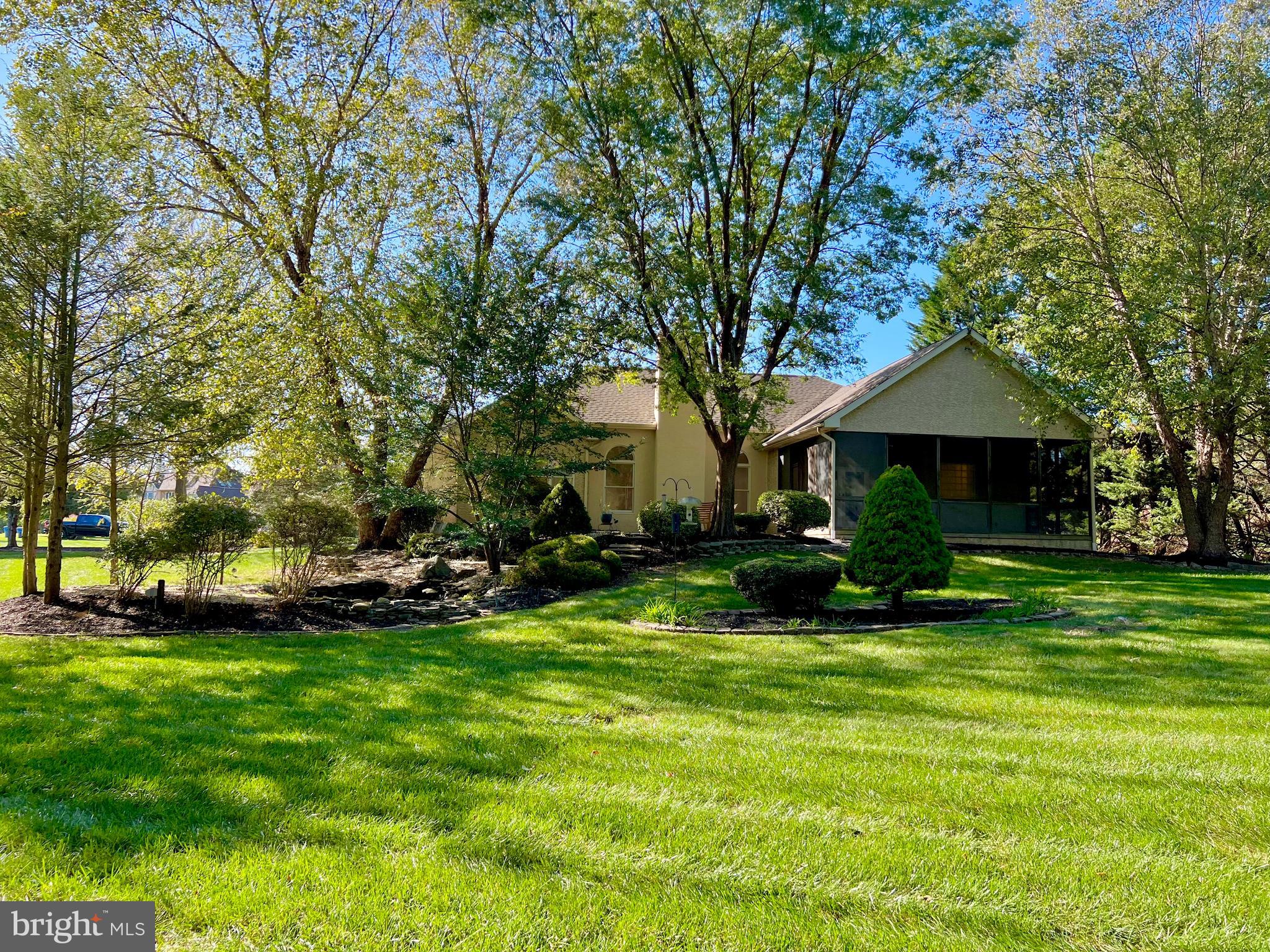 1 Cutter Way Middletown, DE 19709 - Photo 36 of 41 a front view of a house with a garden and trees