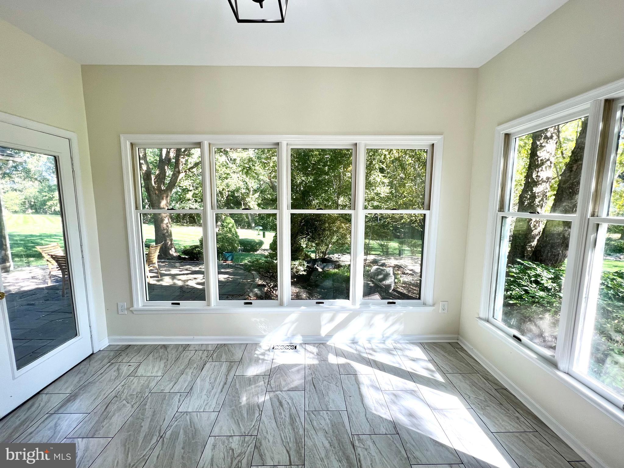 1 Cutter Way Middletown, DE 19709 - Photo 4 of 41 a view of an empty room with wooden floor and a window