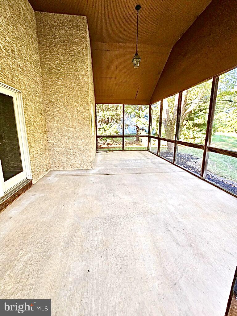 1 Cutter Way Middletown, DE 19709 - Photo 8 of 41 a view of an empty room with a fireplace and a window