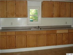 1709 Newland Road Charlotte, NC 28216 - Photo 2 of 4 a sink with a window