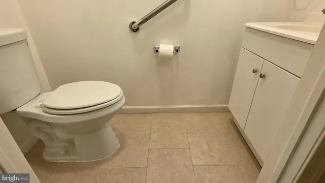 a kitchen with stainless steel appliances granite countertop a stove a refrigerator and a sink