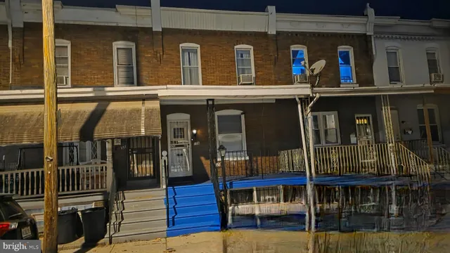 a kitchen with stainless steel appliances granite countertop a refrigerator a sink dishwasher a stove and white countertops with cabinets