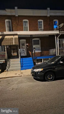 a view of a hallway with stairs