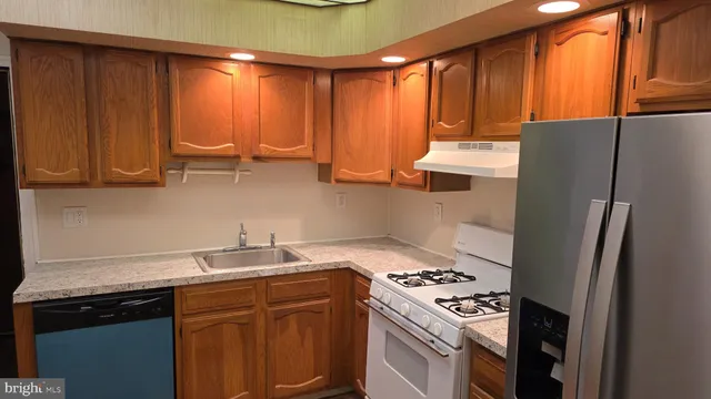 a bathroom with a toilet and a sink