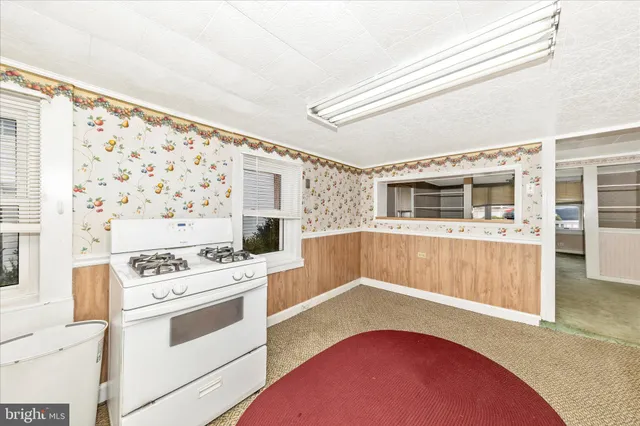 a bathroom with a sink a vanity and a mirror