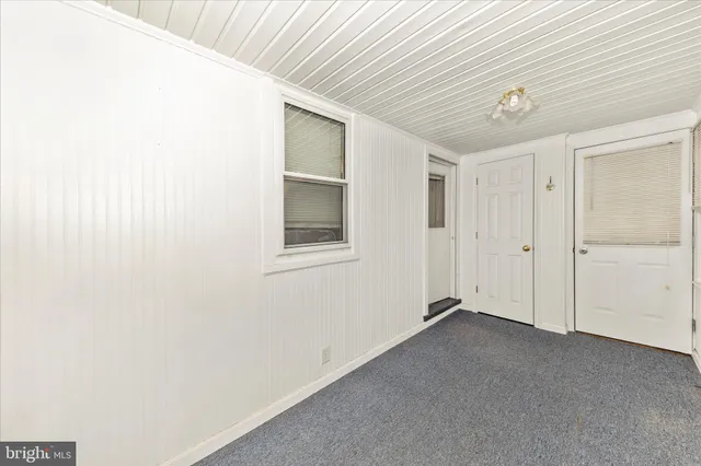 a view of a livingroom with a ceiling fan