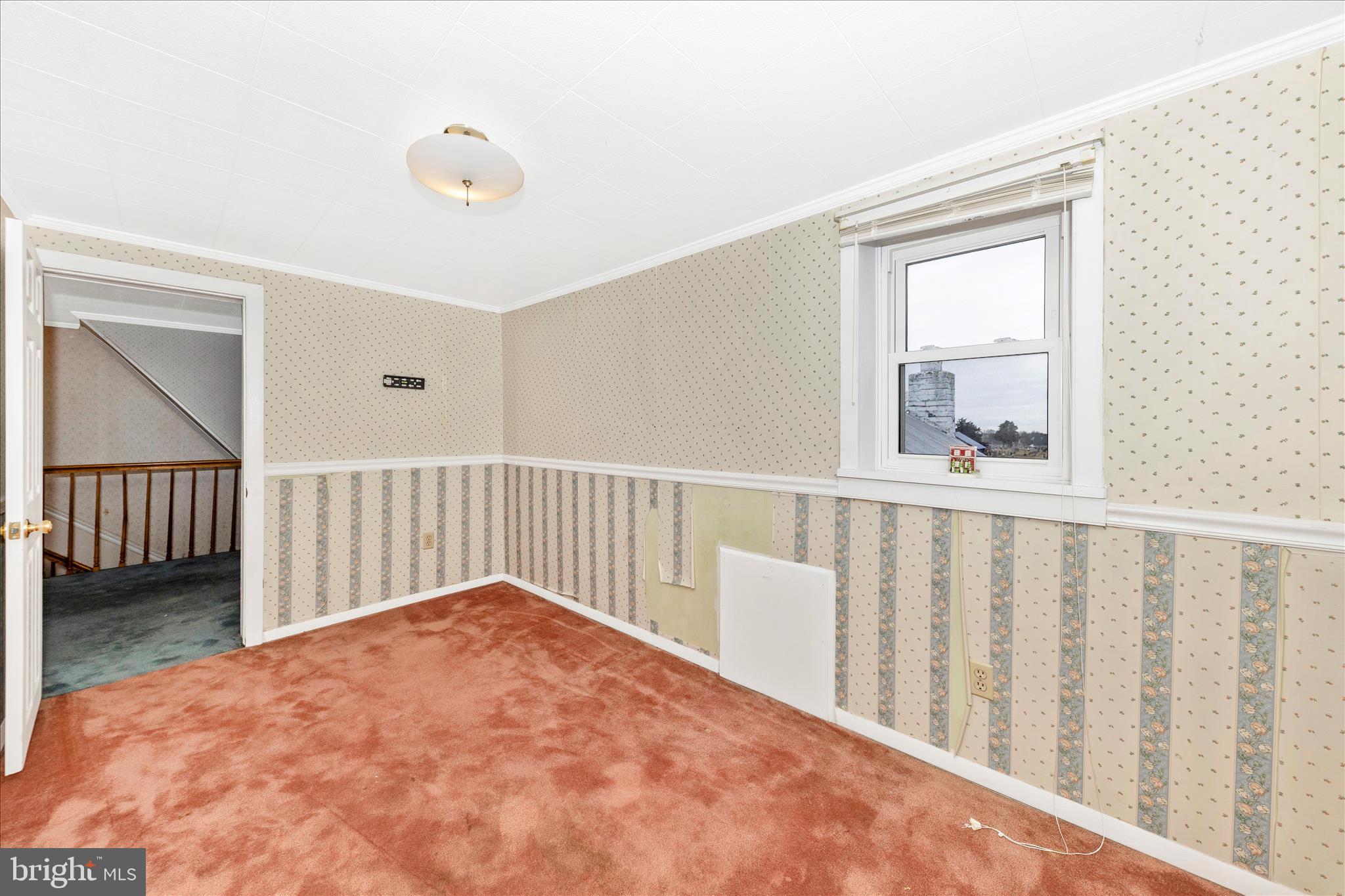 108 South Main Street Boonsboro, MD 21713 - Photo 30 of 50 a view of a hallway with wooden floor and windows