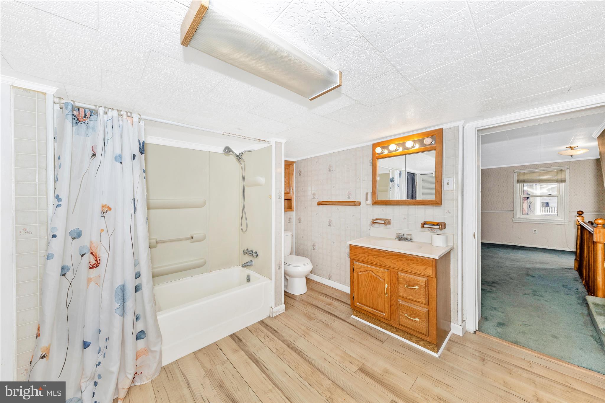 108 South Main Street Boonsboro, MD 21713 - Photo 32 of 50 a view of a bathroom with sink mirror and shower