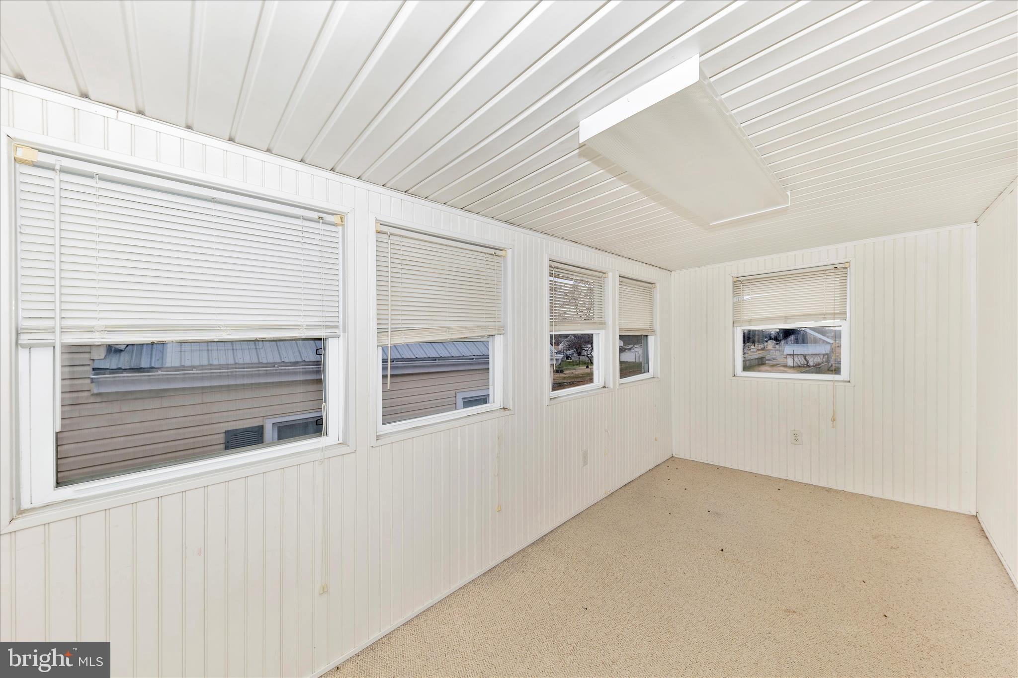 108 South Main Street Boonsboro, MD 21713 - Photo 33 of 50 a view of empty room with windows