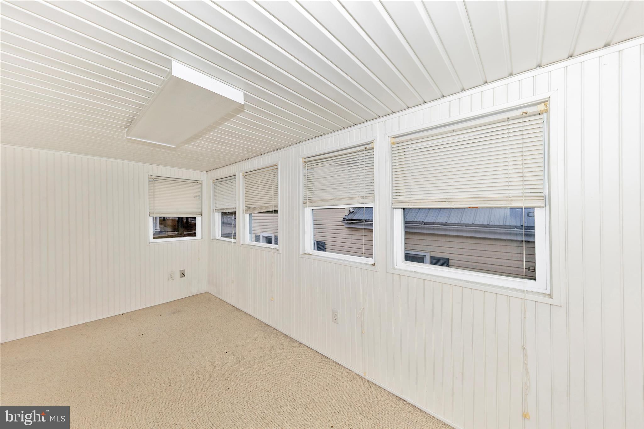 108 South Main Street Boonsboro, MD 21713 - Photo 34 of 50 en empty room with windows
