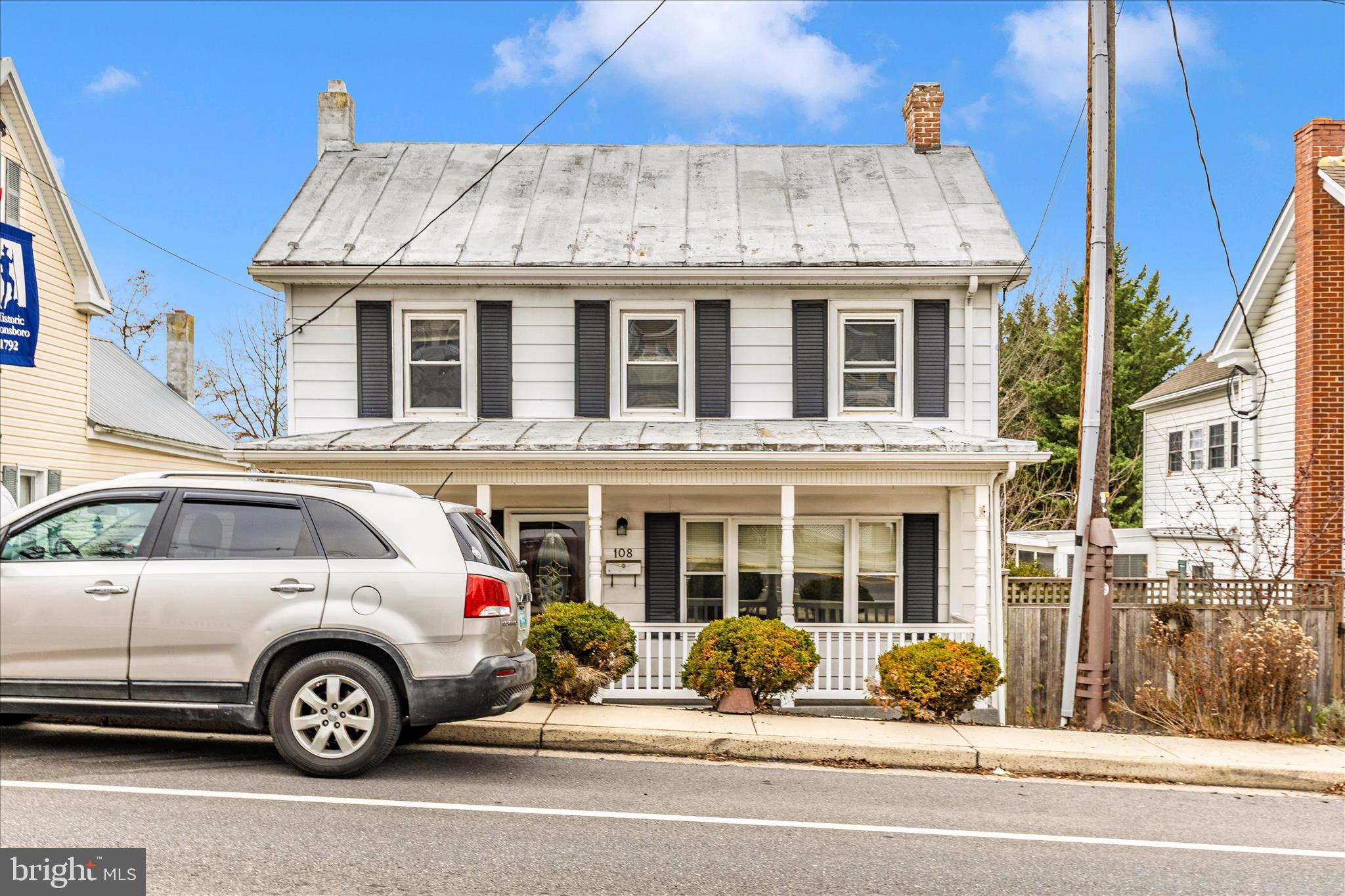 108 South Main Street Boonsboro, MD 21713 - Photo 36 of 50 a front view of a house with parking space