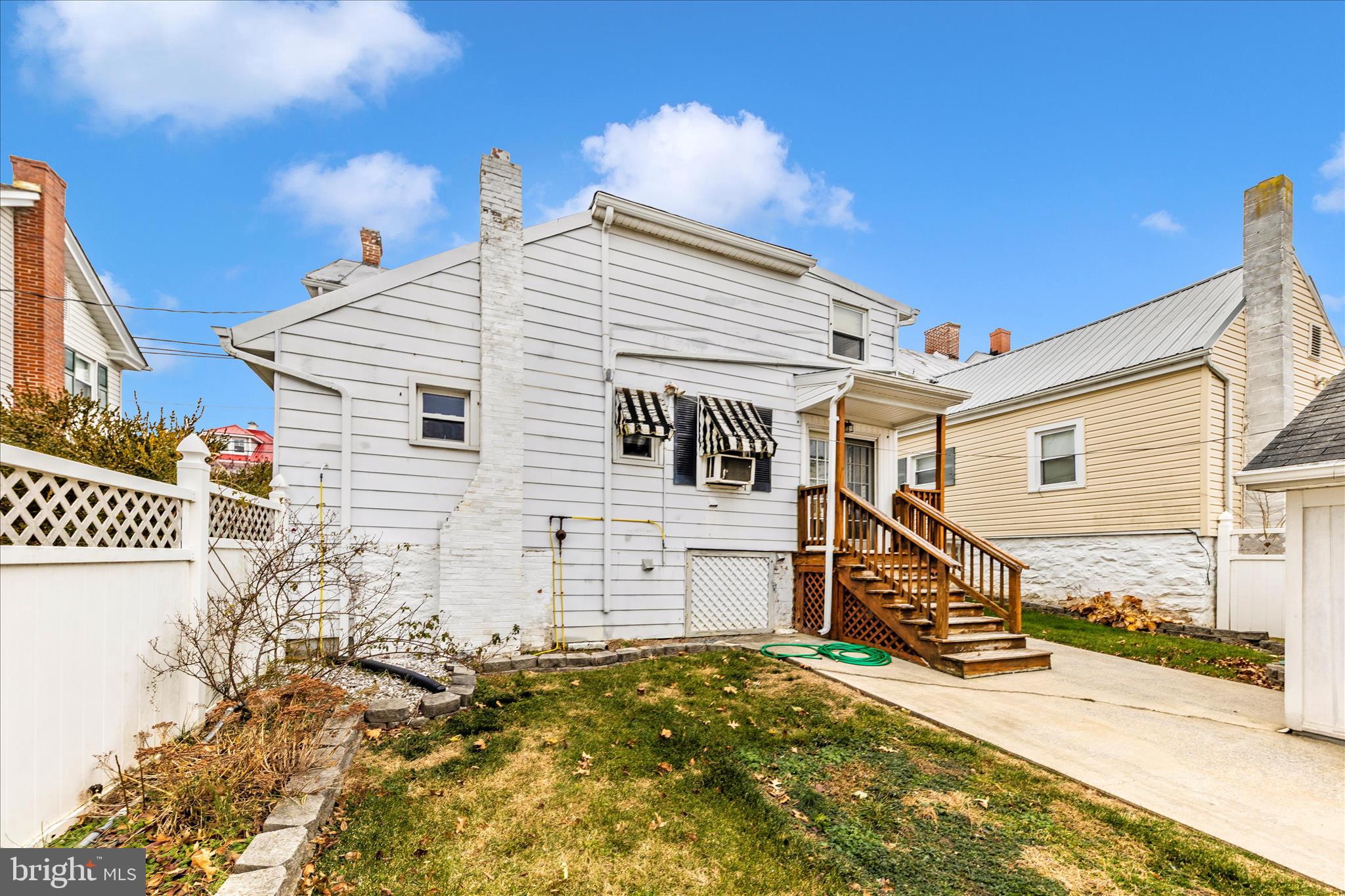 108 South Main Street Boonsboro, MD 21713 - Photo 41 of 50 a view of a house with a wooden fence