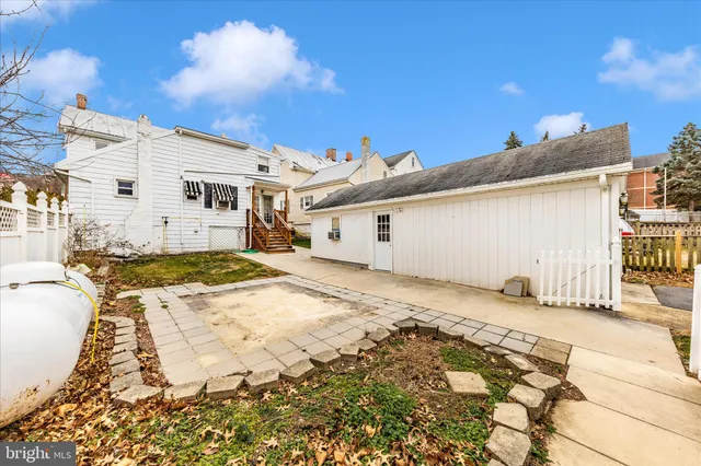 a view of swimming pool with a yard