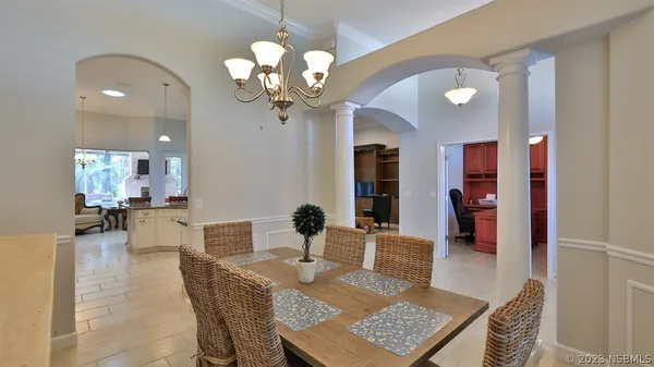 a view of a dining room with furniture