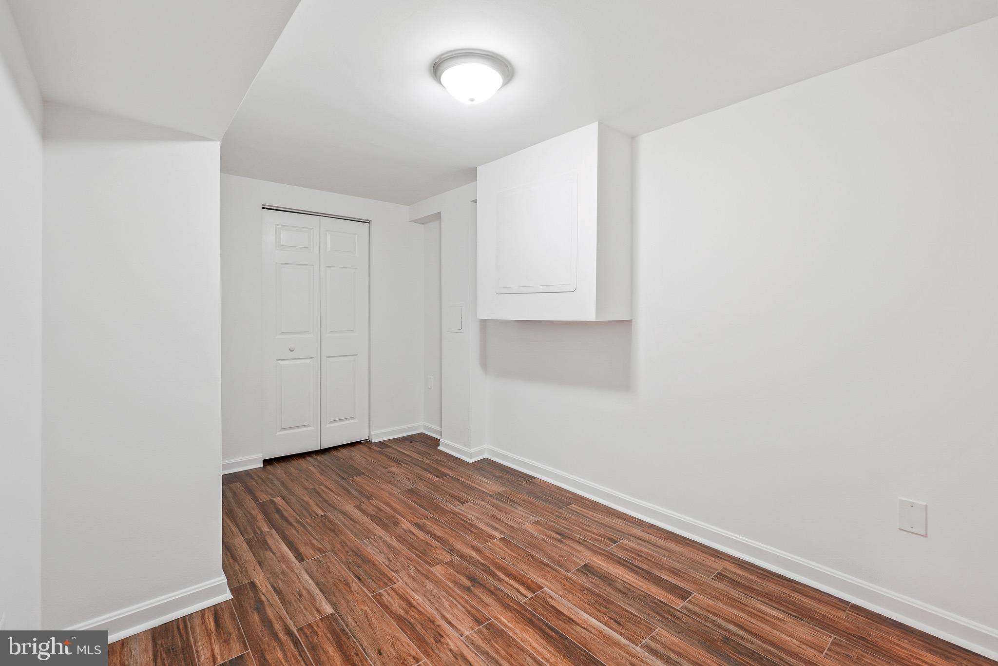 4712 Listra Road Rockville, MD 20853 - Photo 23 of 30 a view of a room with wooden floor and white walls