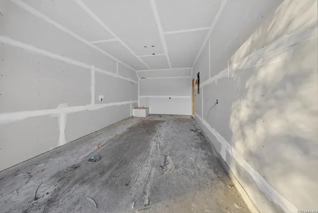 a view of a bathroom from a hallway