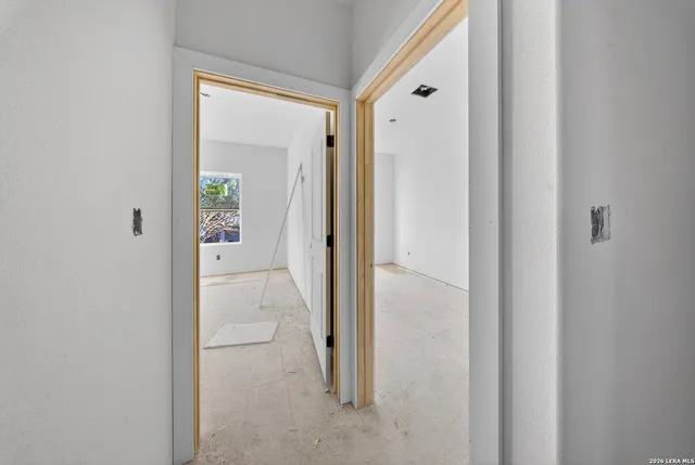 an empty room with windows