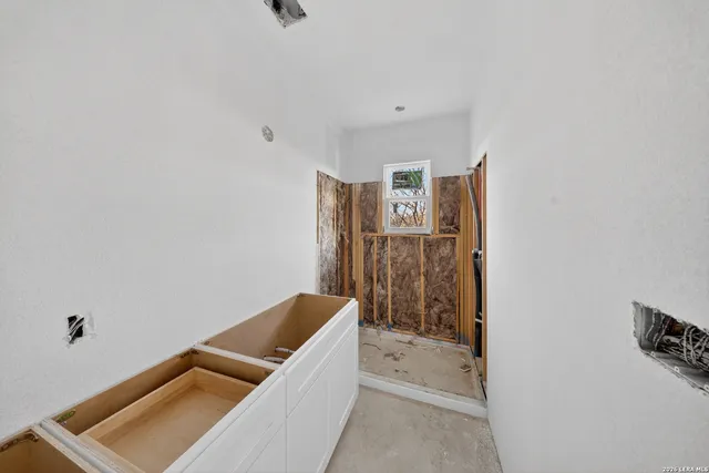 an aerial view of a city with lots of residential buildings