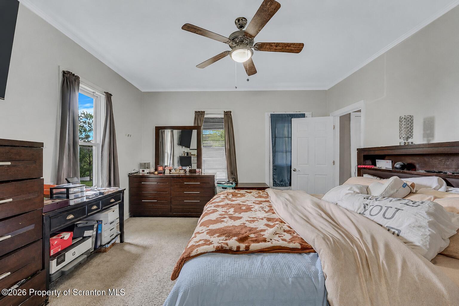29 Rittenhouse Street Simpson, PA 18407 - Photo 15 of 36 a bedroom with a bed and a couch