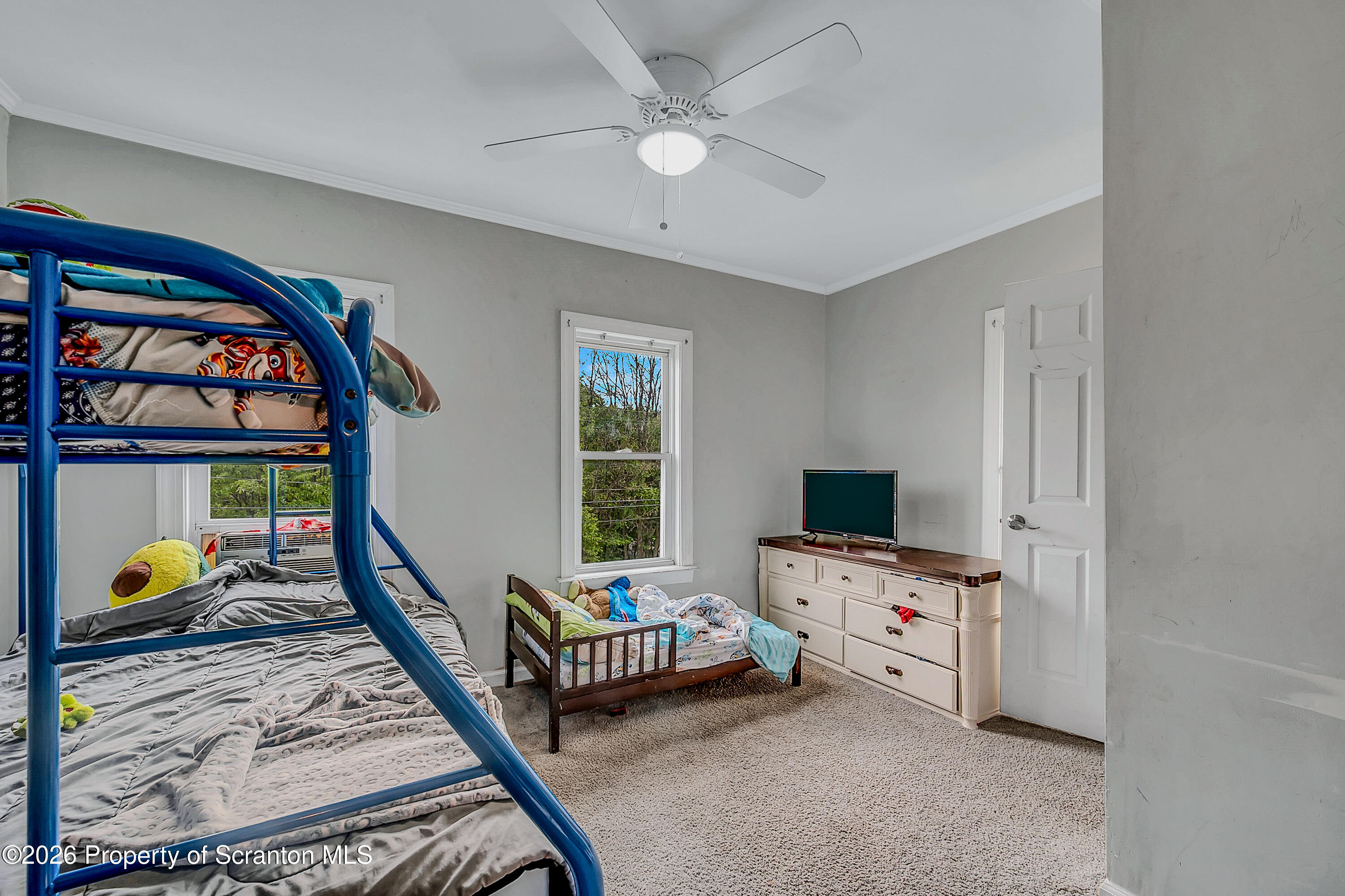 29 Rittenhouse Street Simpson, PA 18407 - Photo 24 of 36 a bedroom with furniture and a window