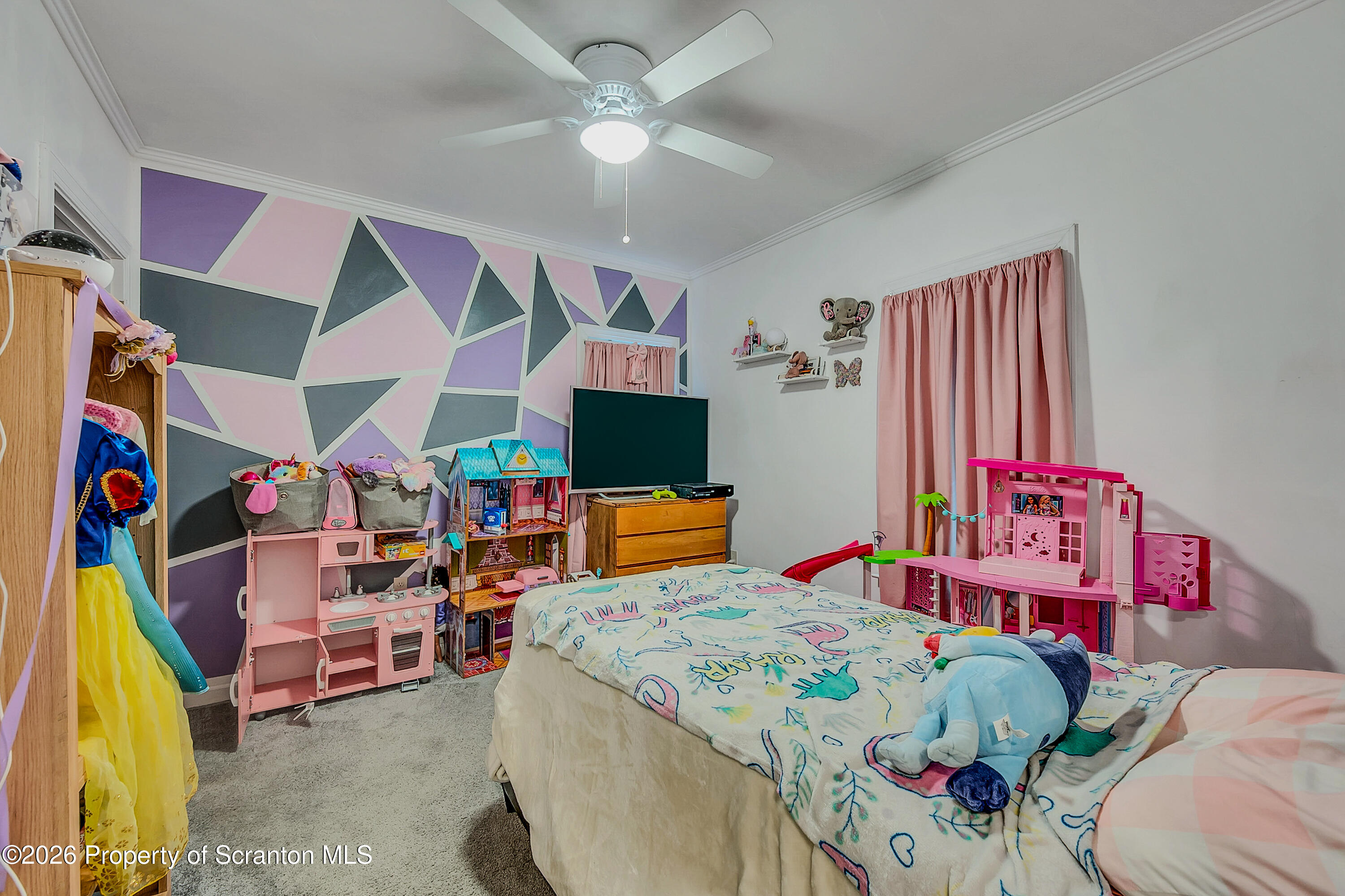 29 Rittenhouse Street Simpson, PA 18407 - Photo 26 of 36 a bed room with a bed and a baby crib