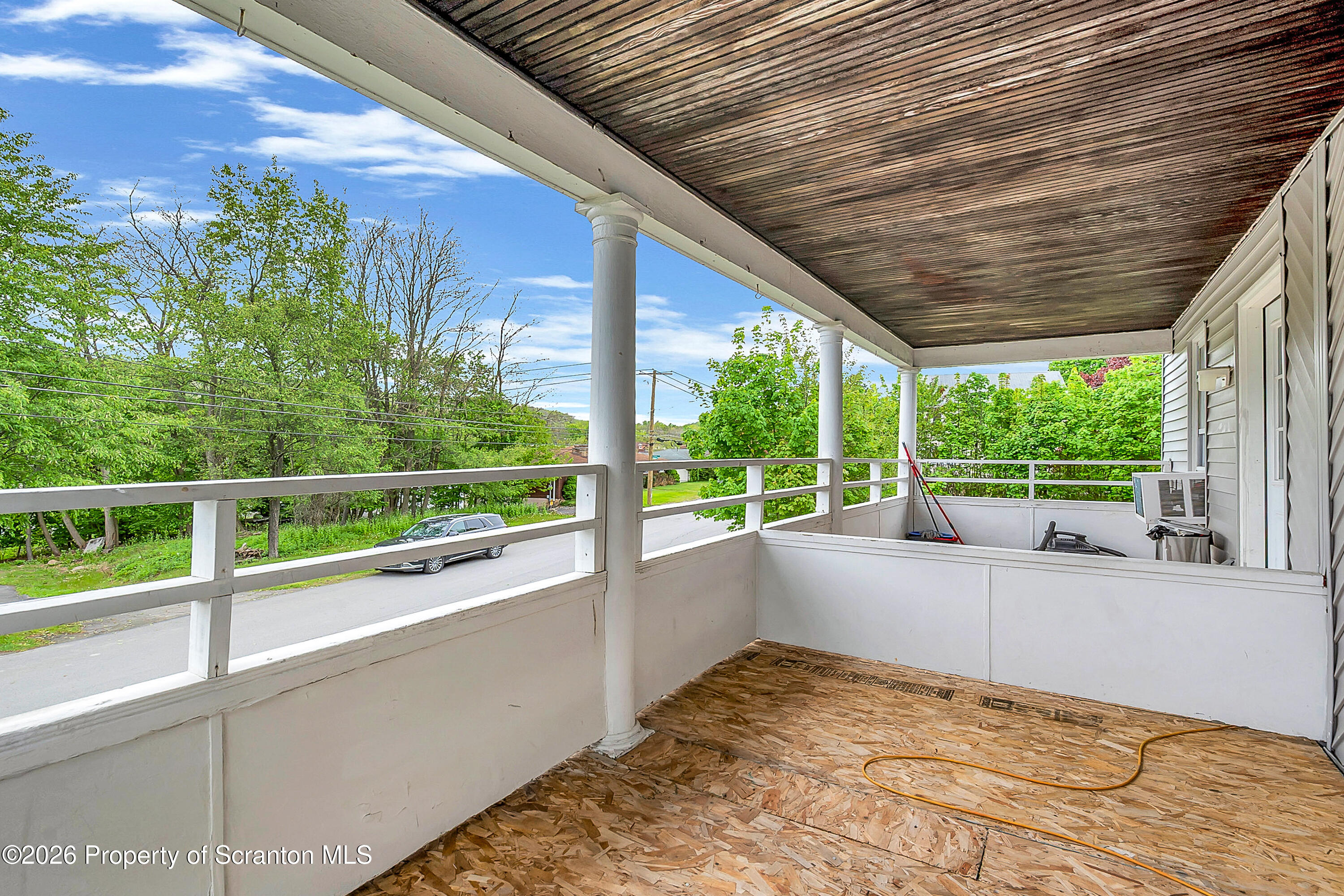 29 Rittenhouse Street Simpson, PA 18407 - Photo 31 of 36 a view of a deck with a yard