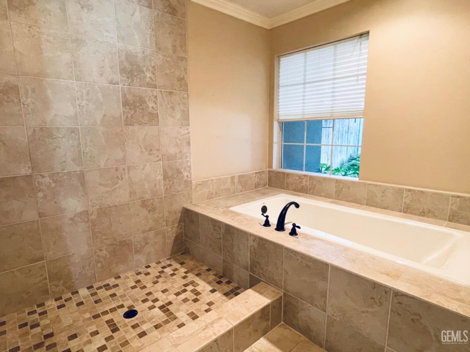 Undisclosed Address Shafter, CA 93263 - Photo 19 of 41 a bathroom with a sink and a bathtub