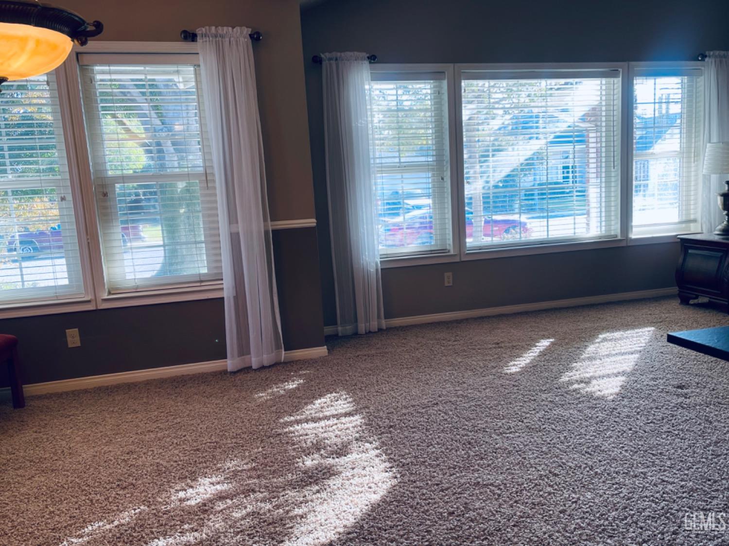 Undisclosed Address Shafter, CA 93263 - Photo 9 of 41 a view of an empty room with a window