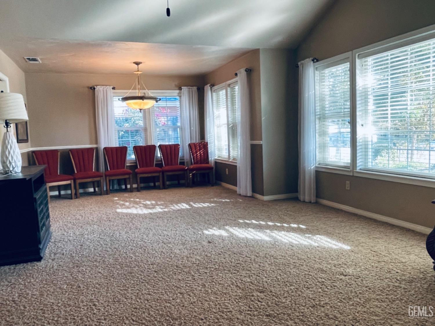 Undisclosed Address Shafter, CA 93263 - Photo 10 of 41 a living room with furniture and a window