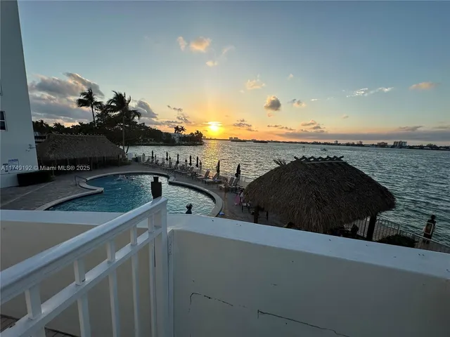 a view of roof deck with patio