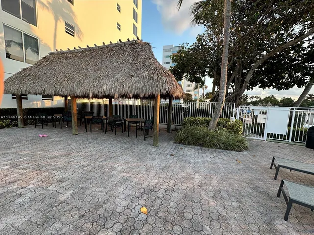a view of a balcony with chairs