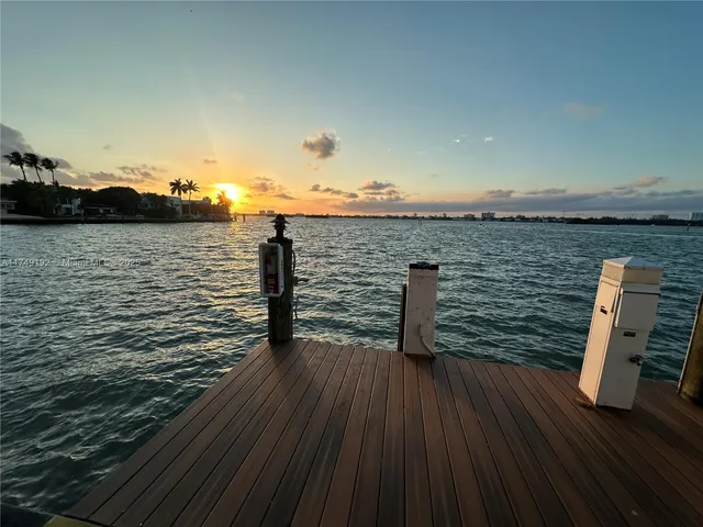 a view of a city street with tall buildings