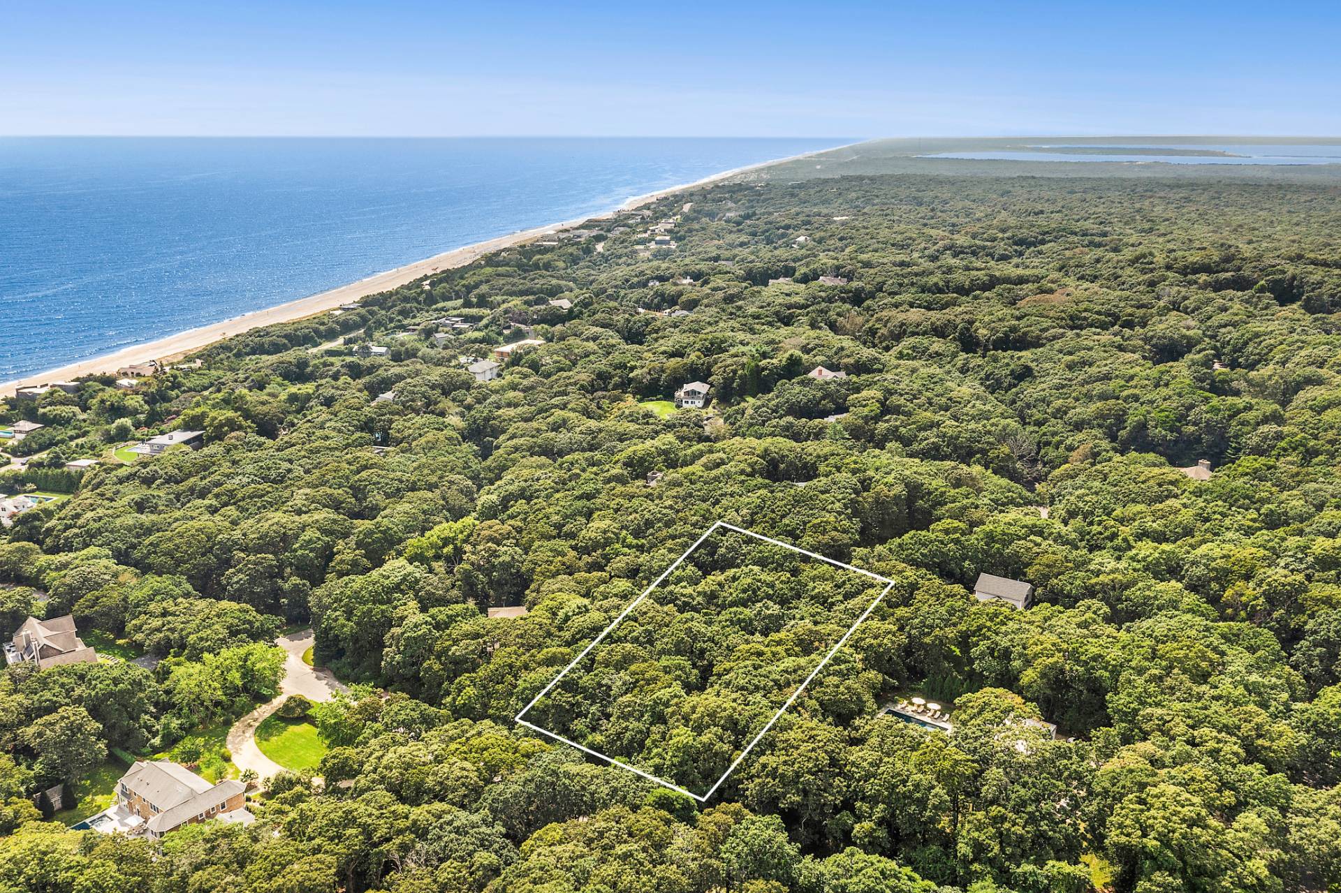 19 Davis Drive Montauk, NY 11954 - Photo 5 of 7 an aerial view of residential houses with outdoor space