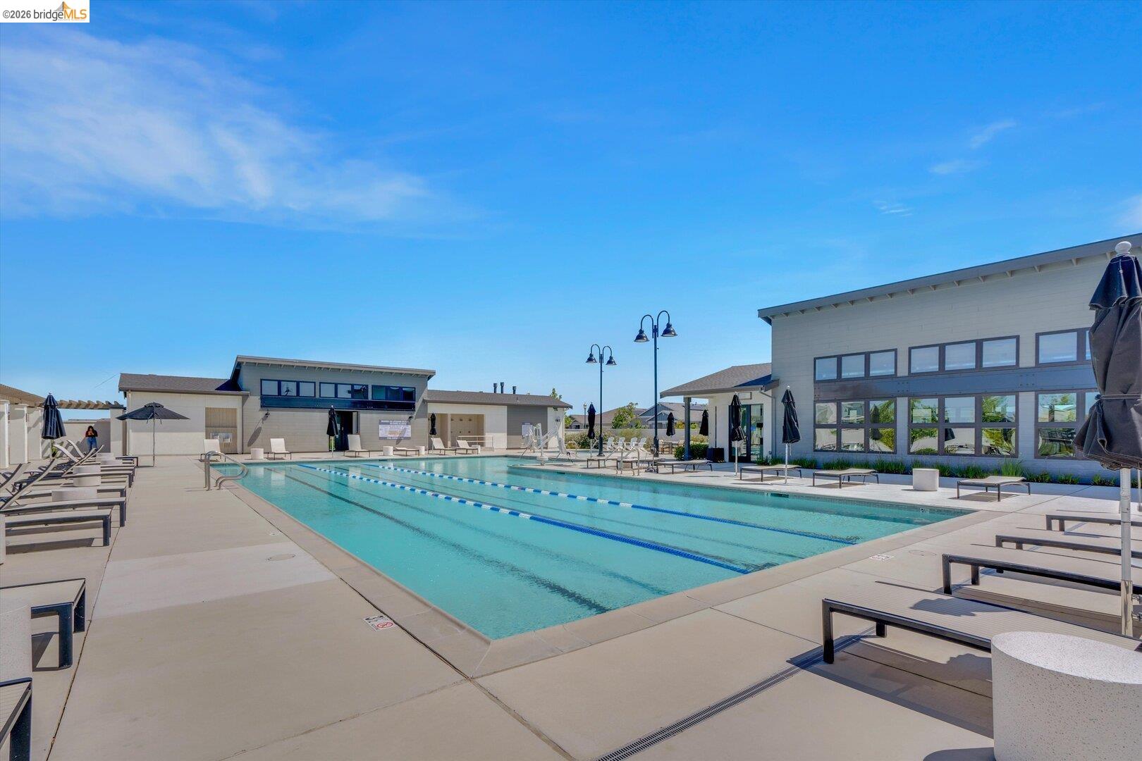 community pool with a patio