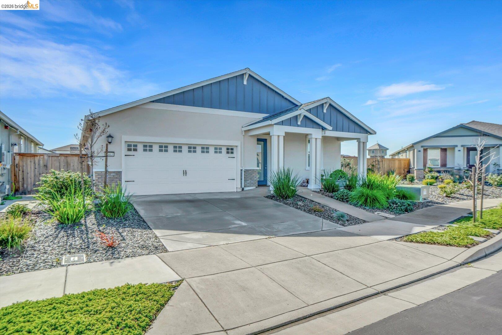 4463 Canada Way Rio Vista, CA 94571 - Photo 14 of 36 craftsman house featuring concrete driveway, an attached garage, stucco siding, board and batten siding, and stone siding