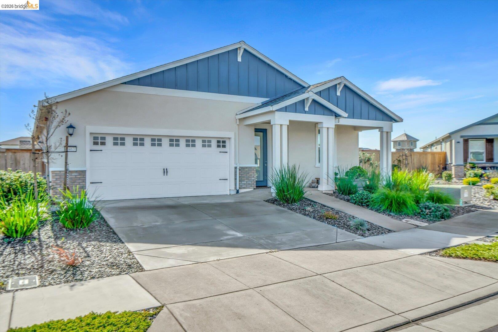 4463 Canada Way Rio Vista, CA 94571 - Photo 15 of 36 craftsman house with an attached garage, driveway, board and batten siding, and stucco siding